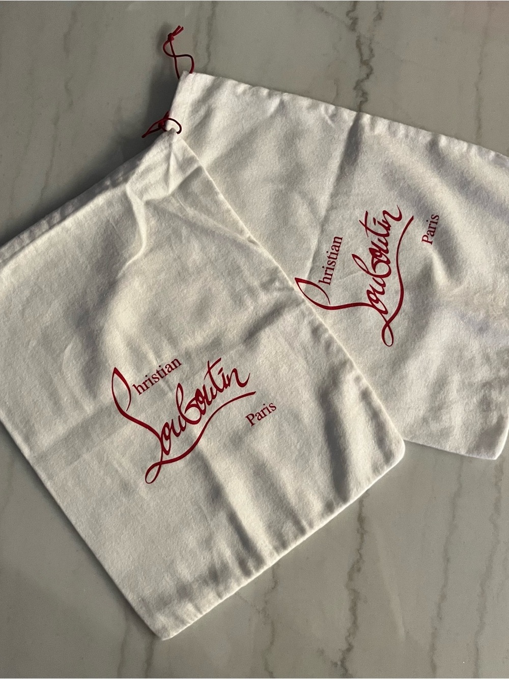Christian Louboutin White Dust Bags with Red Script Logo